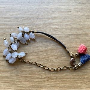 Noonday Collection bracelet, white beads -tassels